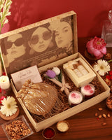 The Luxe Blossom Hamper Twinkle by The Tan Clan featuring a beautifully arranged gift hamper with floral accents and luxury items.