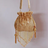 Gold Twinkle Heavy Tassles Potli bag with handle from The Tan Clan, featuring intricate tassle details and elegant design.