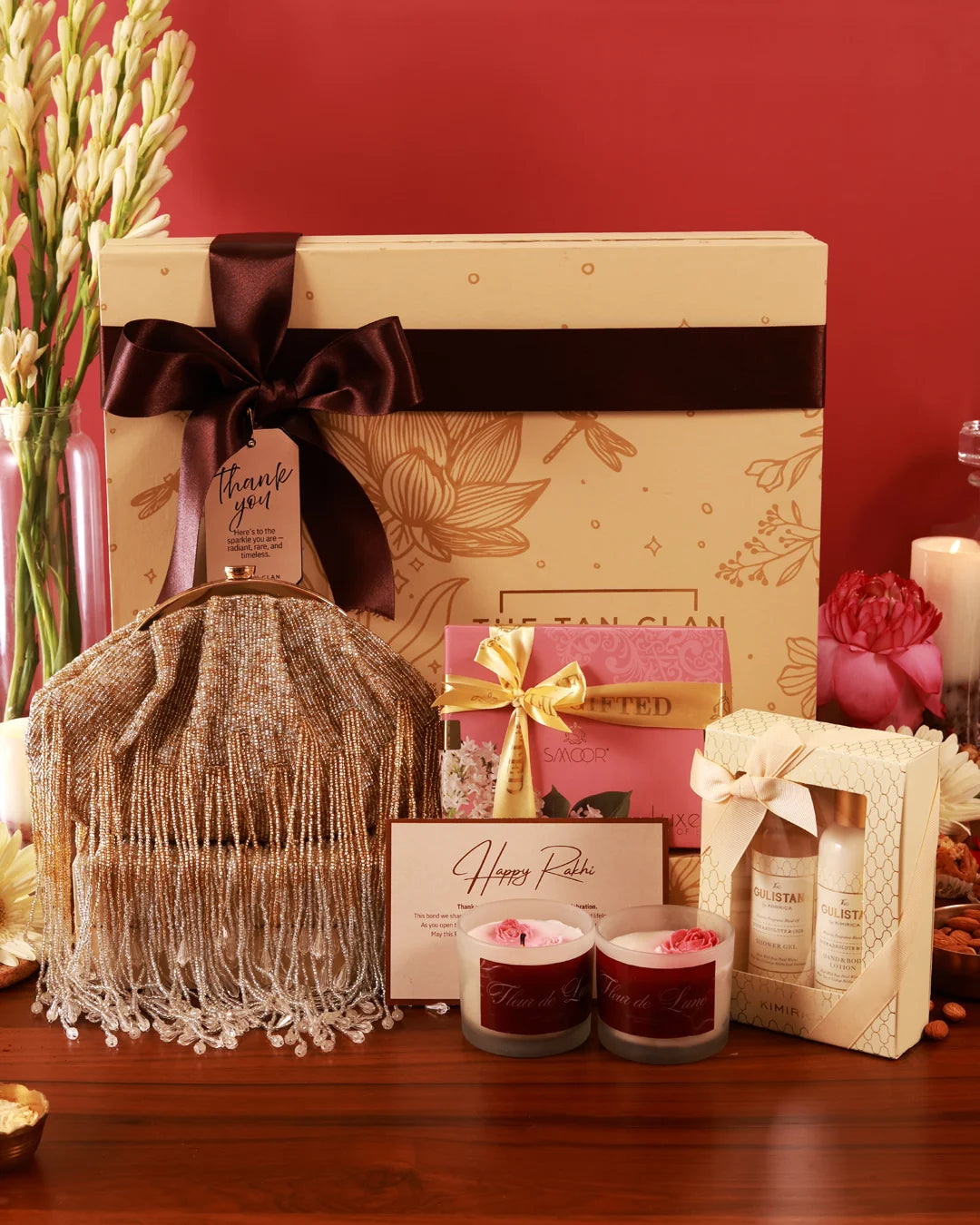 Luxurious pamper hamper from The Tan Clan featuring skincare products, relaxation essentials, and beauty treats in elegant packaging.