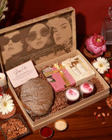 The Tan Clan Ultimate Pamper Hamper Amour with skincare products, luxurious spa items, and plush accessories in elegant packaging.