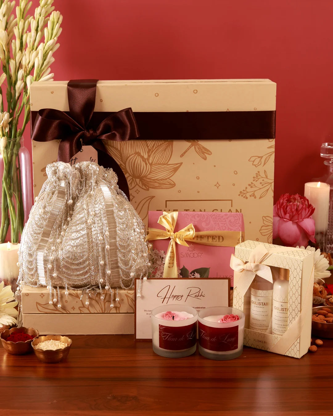 Luxury pamper hamper by The Tan Clan featuring skincare products, spa items, and cozy essentials in an elegant gift box.