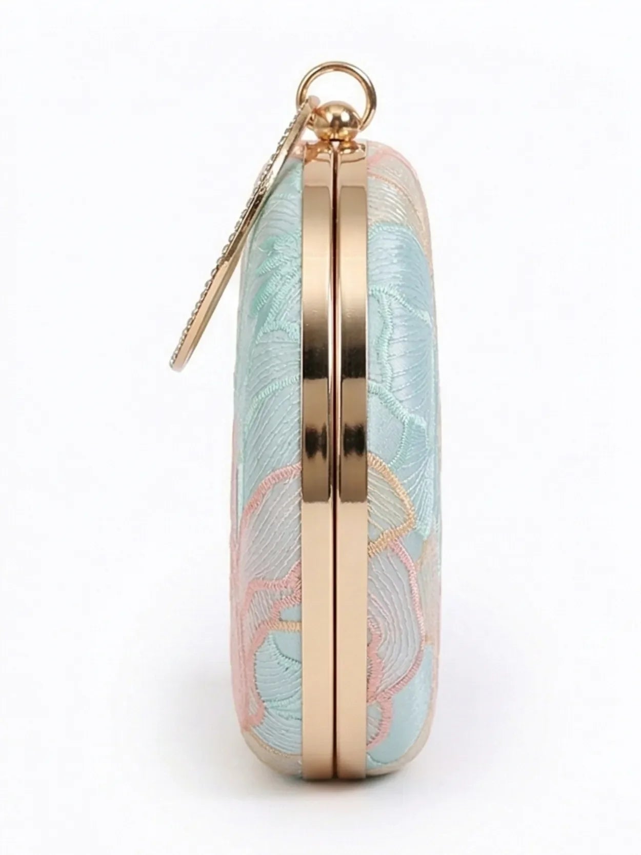 Tide Blue round clutch purse by The Tan Clan with a sleek, minimalist design and smooth finish, perfect for evening accessories.