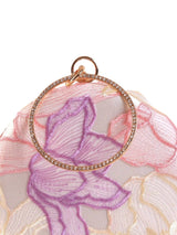 Pink round clutch bag by The Tan Clan featuring a sleek design and compact size for stylish everyday use.