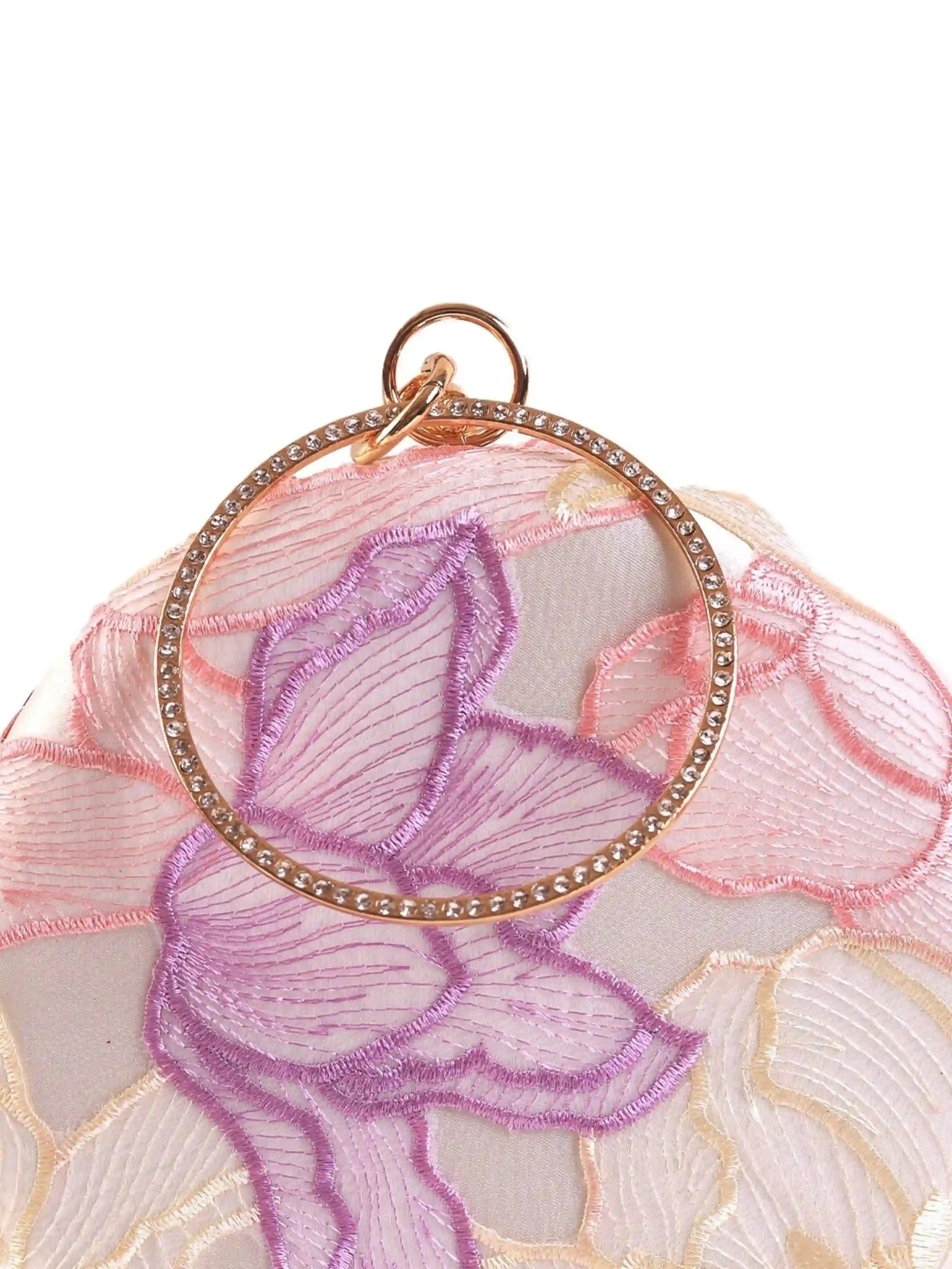 Pink round clutch bag from The Tan Clan featuring a smooth finish and compact design, perfect for accessories or essentials.