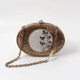 Elegant Titly wirework clutch by The Tan Clan with mother of pearl accents and intricate design, perfect for evening wear.