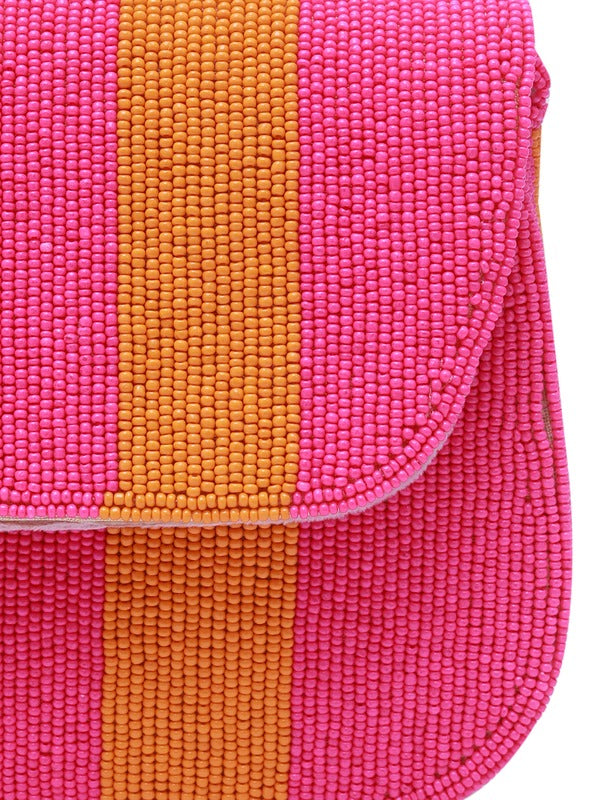 Orange and pink tulip-shaped baguette bag with a handle by The Tan Clan, featuring a stylish and colorful design.