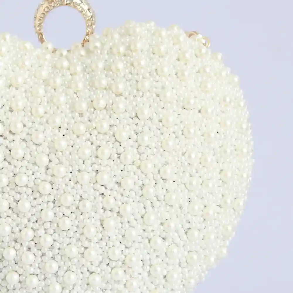 Ulfat All White Pearl Hand Embroidered Heart Clutch with pearl details and embroidered heart design, crafted by The Tan Clan.