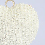 Ulfat All White Pearl Hand Embroidered Heart Clutch with pearl details and embroidered heart design, crafted by The Tan Clan.