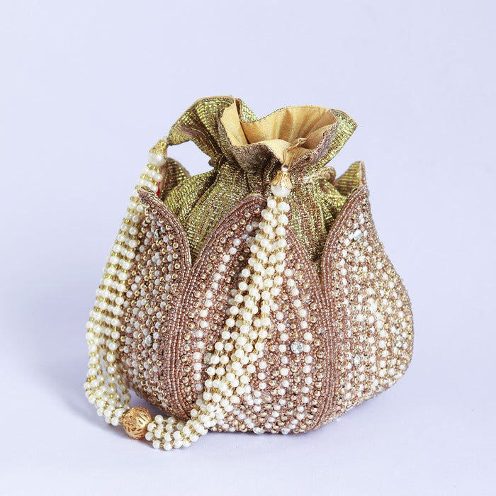 Hand-embroidered mini lotus potli bag by The Tan Clan with intricate embroidery and traditional design.