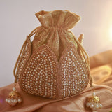 Hand-embroidered Uttara Mini Lotus Potli bag by The Tan Clan with intricate embroidery and a compact, elegant design.