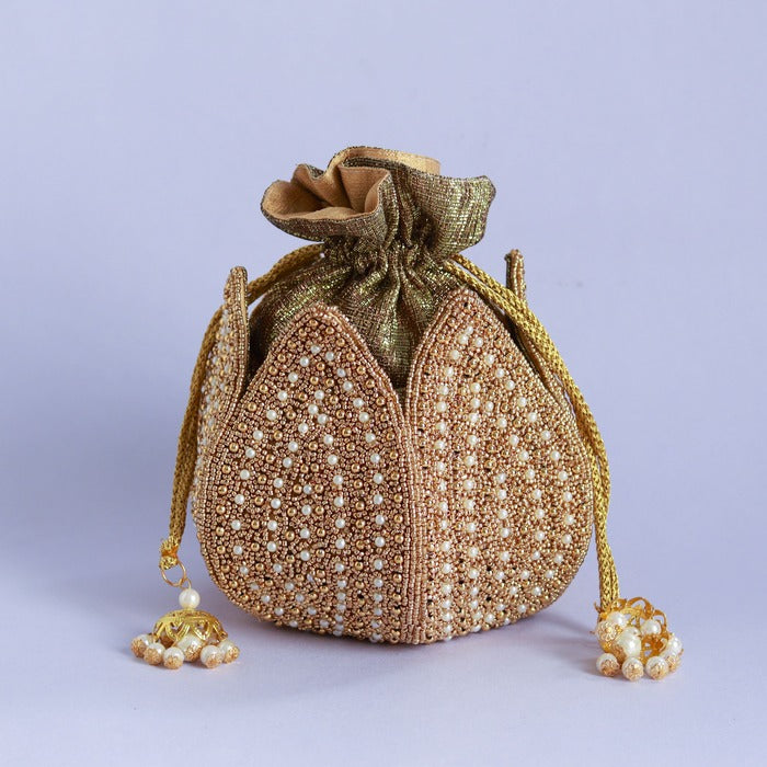 Uttara hand-embroidered mini lotus potli bag by The Tan Clan with intricate threadwork and traditional design.