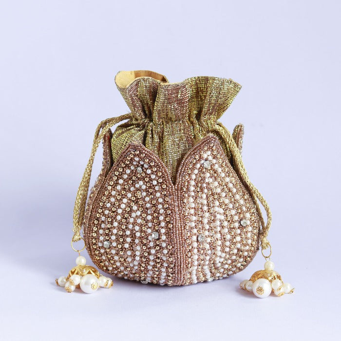 Hand-embroidered mini lotus potli bag by The Tan Clan with intricate embroidery and a drawstring closure, perfect for traditional occasions.