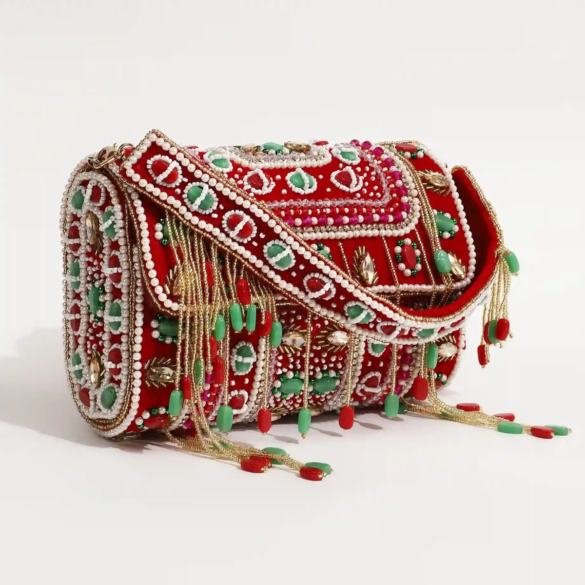 Tan Clan Wedlock flap-over clutch bag featuring a sleek design with a fold-over closure and stylish detailing.