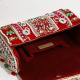 Tan Wedlock Flap Over Clutch Bag by The Tan Clan, featuring a sleek design with a flap closure and compact style.