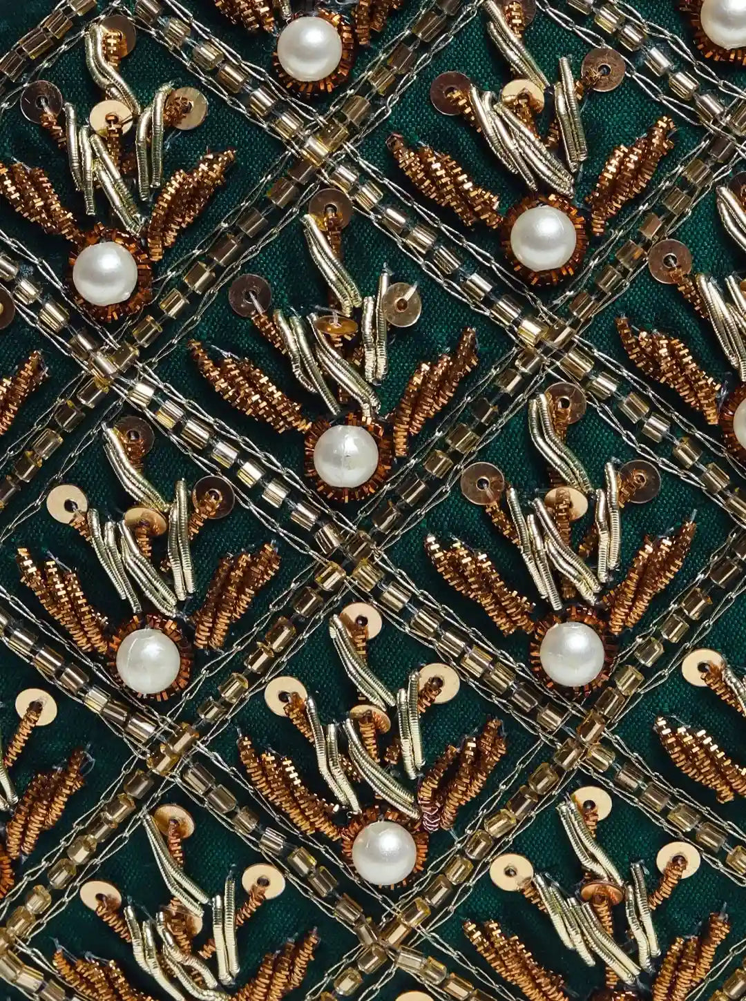 Zafraan hand-embroidered clutch bag with intricate designs, crafted by The Tan Clan, featuring traditional embroidery details.