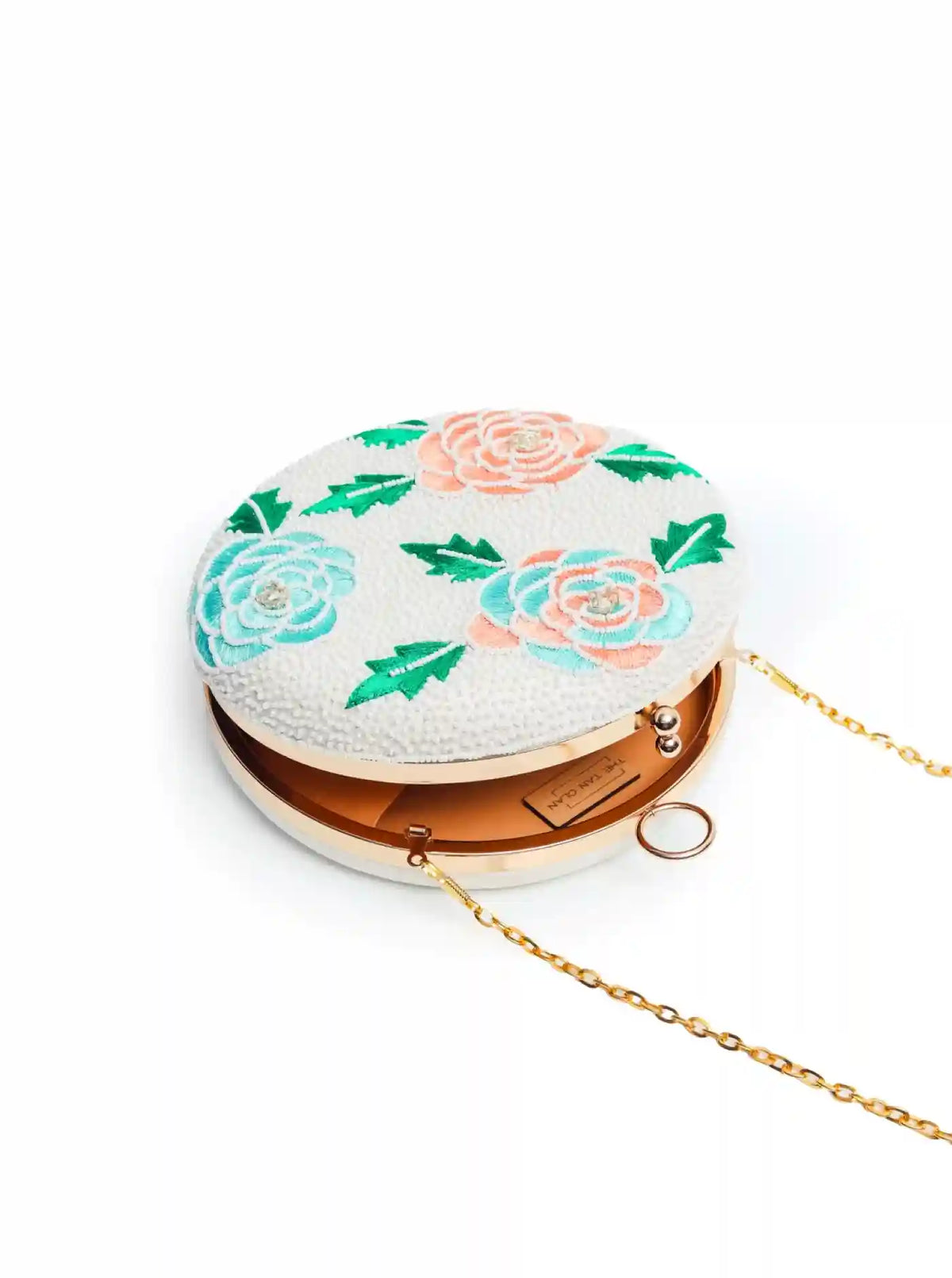 Round floral embroidered clutch bag by The Tan Clan with intricate hand embroidery and vibrant floral patterns.