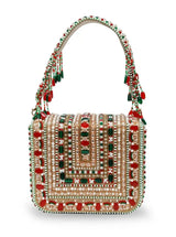The Tan Clan Abby flap over bag featuring a stylish leather flap design and structured body in a neutral color.