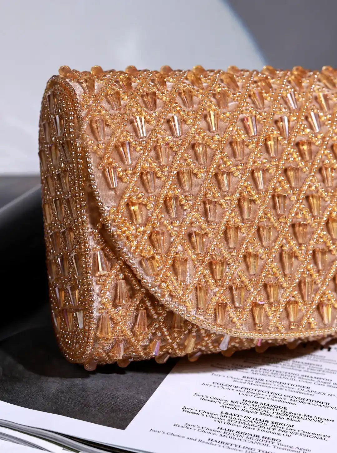Claire Gold Flap Over Bag from The Tan Clan, stylish flap bag with gold accents, shown with the flap open and interior view.