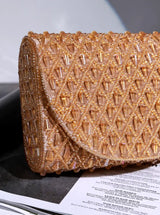 Claire Gold Flap Over Bag from The Tan Clan, stylish flap bag with gold accents, shown with the flap open and interior view.