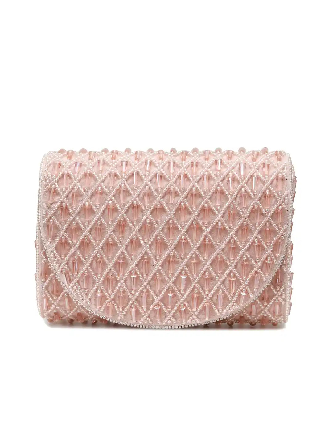 Pink Claire flap-over bag by The Tan Clan, stylish flap bag with a feminine design and adjustable strap.