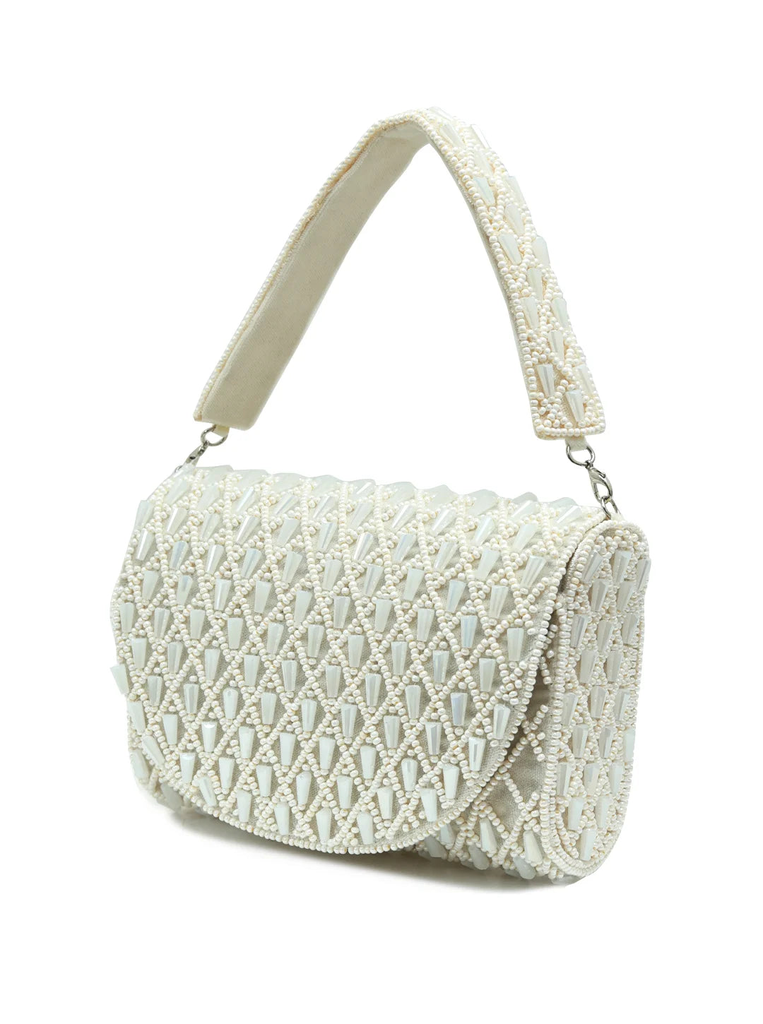 Claire White flap-over bag by The Tan Clan, stylish leather flap bag with a sleek design and adjustable shoulder strap.