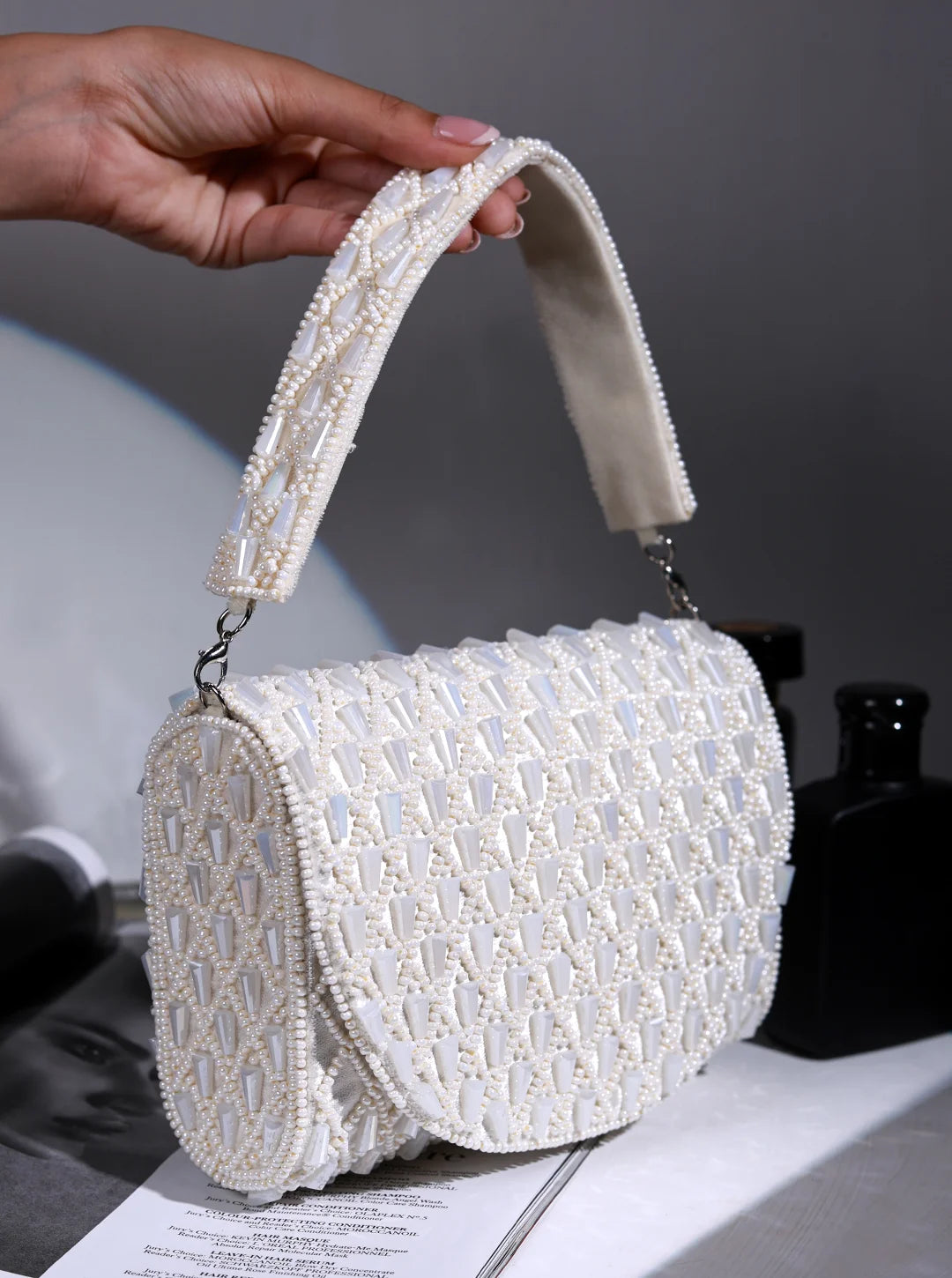 Claire White Flap Over Bag by The Tan Clan, stylish flap bag with a sleek white design and modern silhouette.