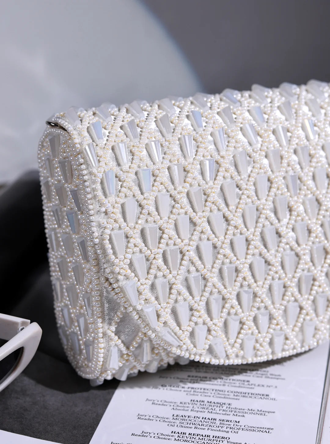 Claire White Flap Over Bag by The Tan Clan, stylish white leather flap bag with a sleek design and gold-tone hardware.