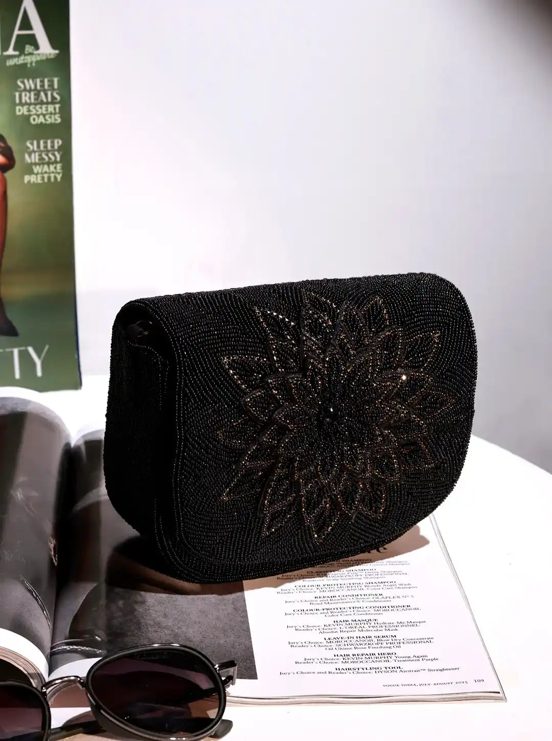 Eva Black Flap Over Bag by The Tan Clan, stylish flap bag with sleek black design and top flap closure, perfect for everyday use.