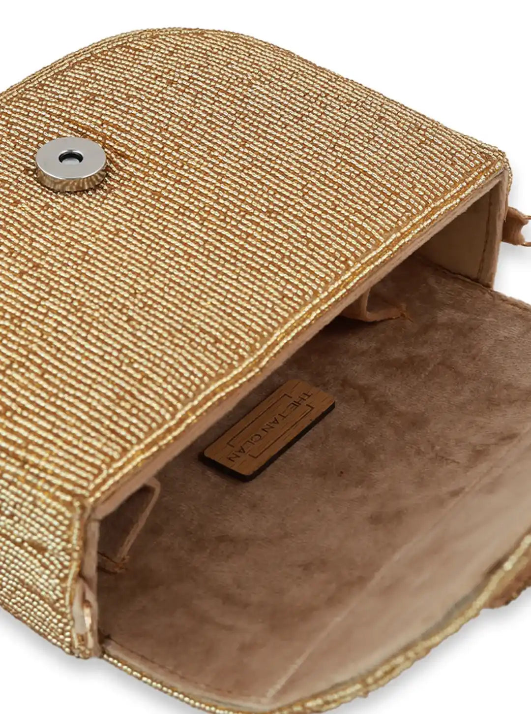 Eva Gold Flap Over Bag by The Tan Clan, a stylish flap bag with gold accents, featuring a sleek design and durable material.