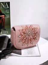 Eva Pink Flap Over Bag by The Tan Clan, stylish pink leather flap bag with a sleek design and adjustable strap.