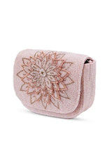 Eva pink flap-over bag from The Tan Clan, stylish flap bag with a sleek design and adjustable strap.