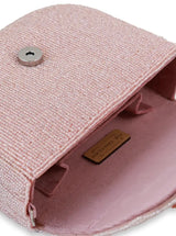 Eva pink flap-over bag by The Tan Clan featuring a stylish design with a top flap closure and shoulder strap.