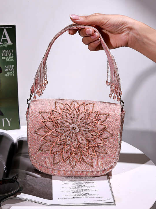 Eva Pink Flap Over Bag by The Tan Clan, a stylish pink flap bag with gold accents, made of durable material, front flap closure.