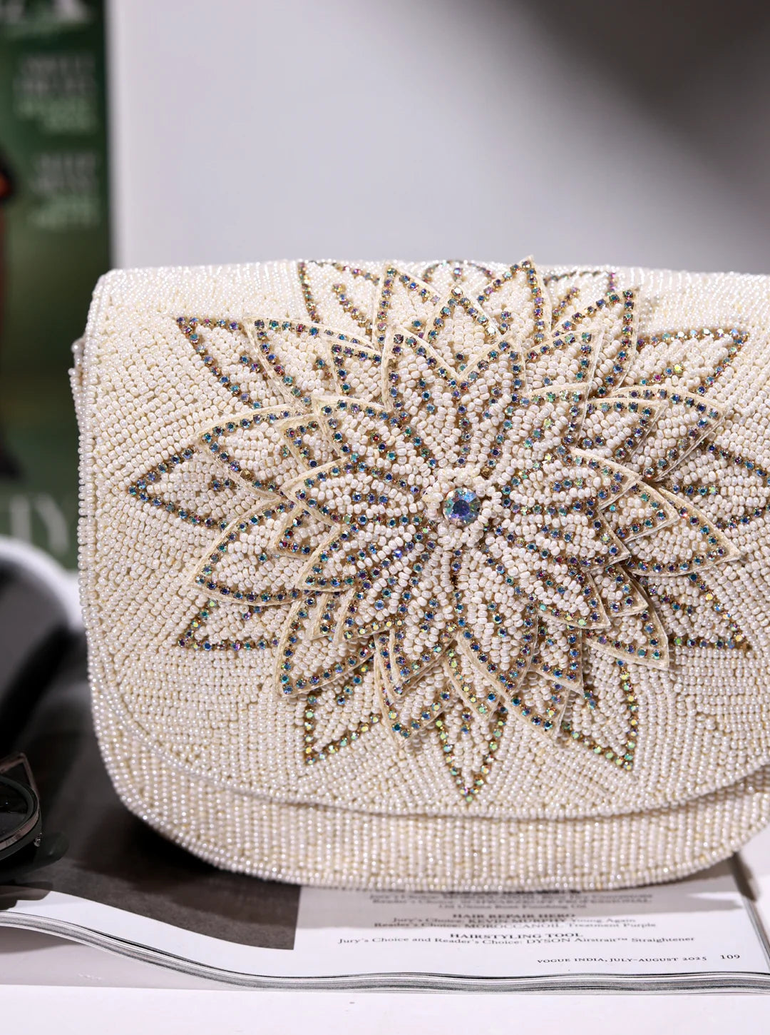 Eva White Flap Over Bag by The Tan Clan, stylish white flap bag with a sleek design and adjustable strap.