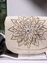 Eva White Flap Over Bag by The Tan Clan, stylish white flap bag with a sleek design and adjustable strap.