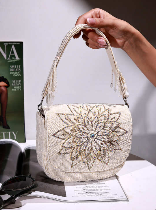 Eva White Flap Over Bag by The Tan Clan, stylish white flap bag with a sleek design and gold-tone hardware.