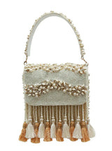 The Tan Clan Jena embellished flap-over bag featuring a stylish flap design and decorative embellishments on soft leather.