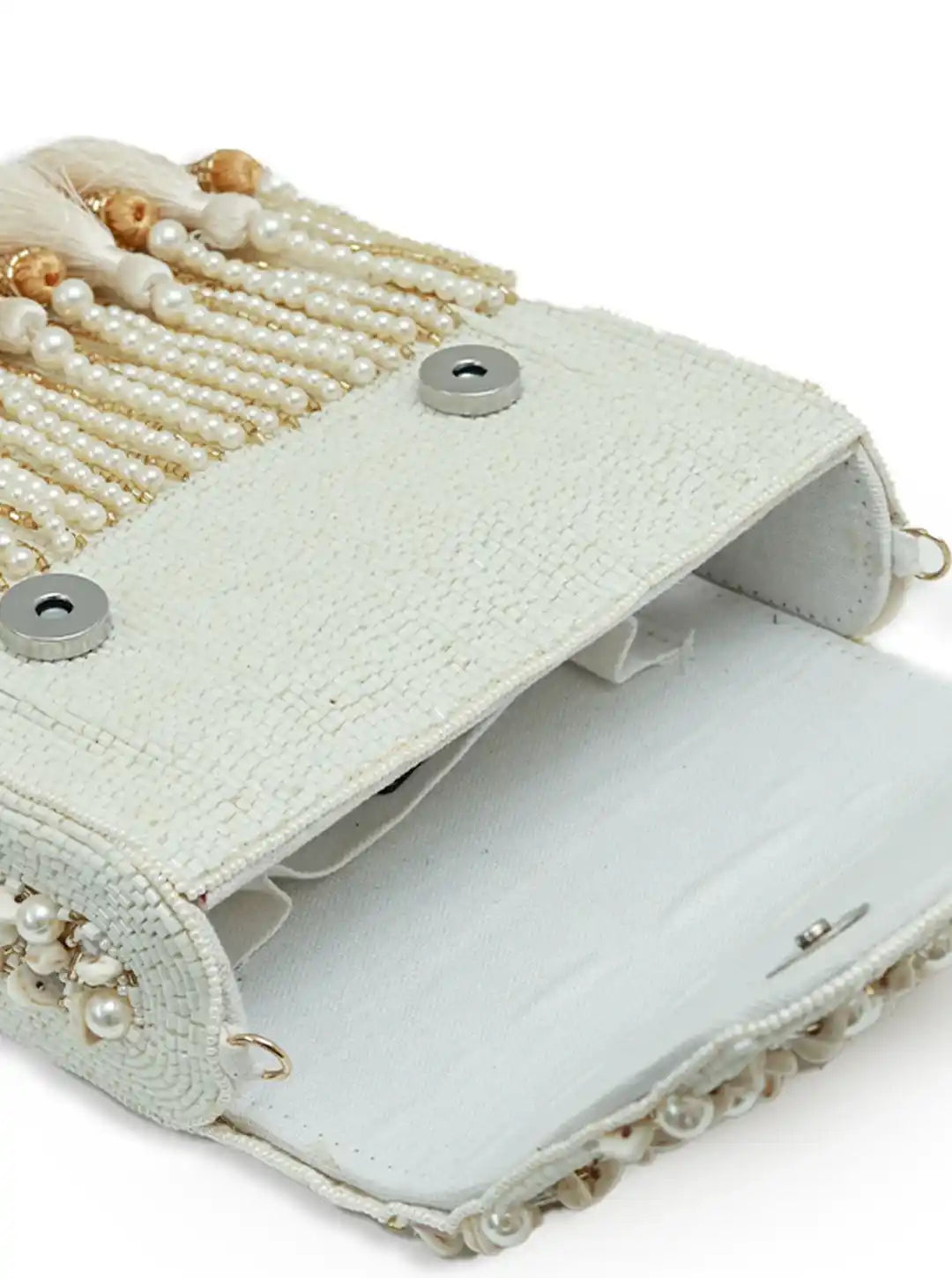 The Tan Clan Jena embellished flap over bag with detailed embroidery and gold-tone hardware on a stylish handbag.