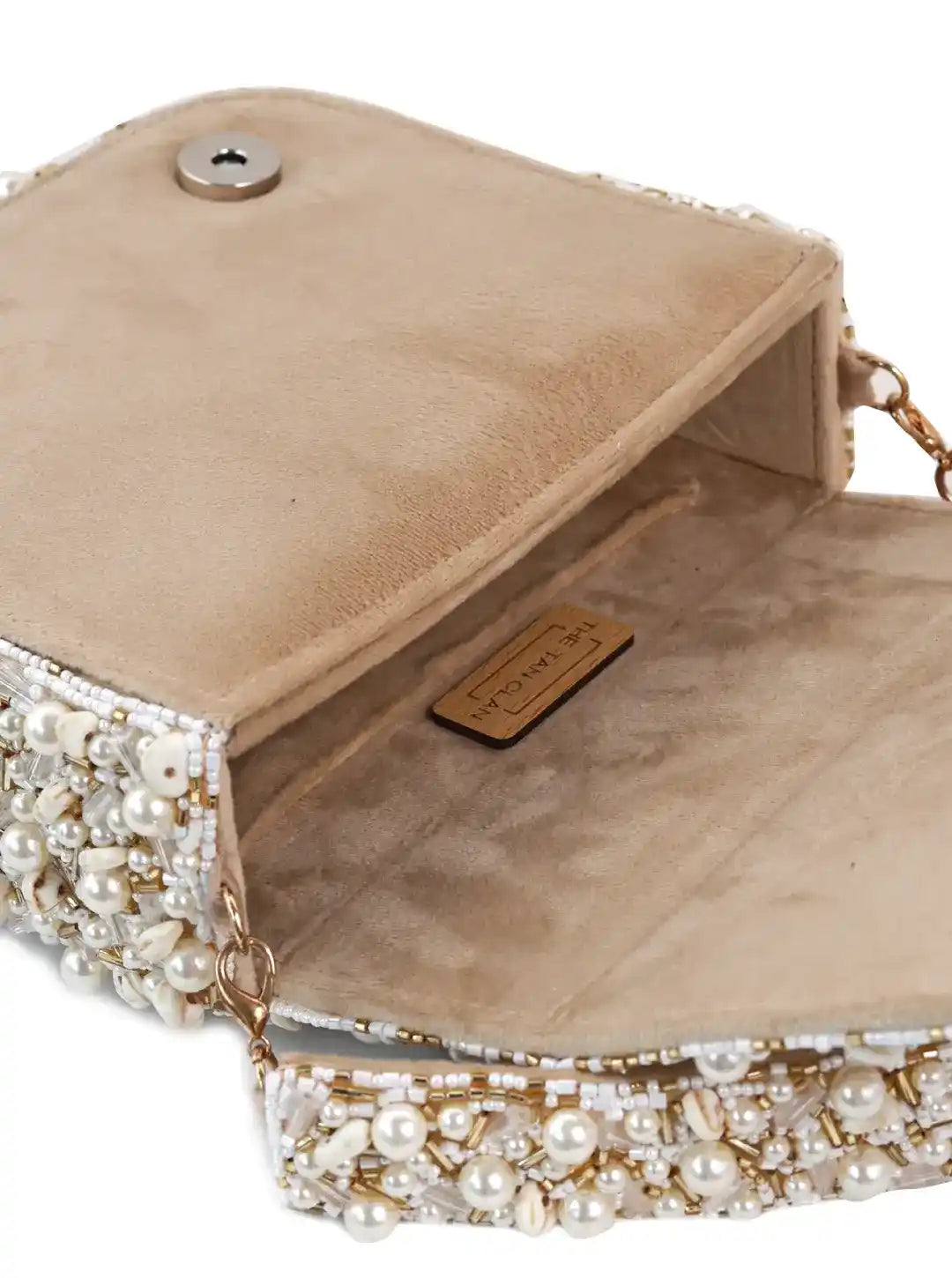 Tan Kate Flap Over Bag from The Tan Clan featuring a classic flap design and sleek leather finish.