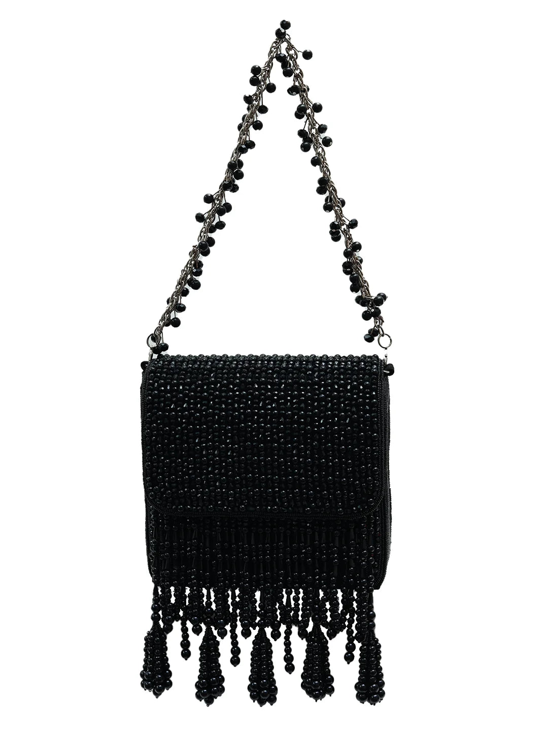 Mira black flap-over bag by The Tan Clan, stylish leather handbag with a flap closure and adjustable strap.