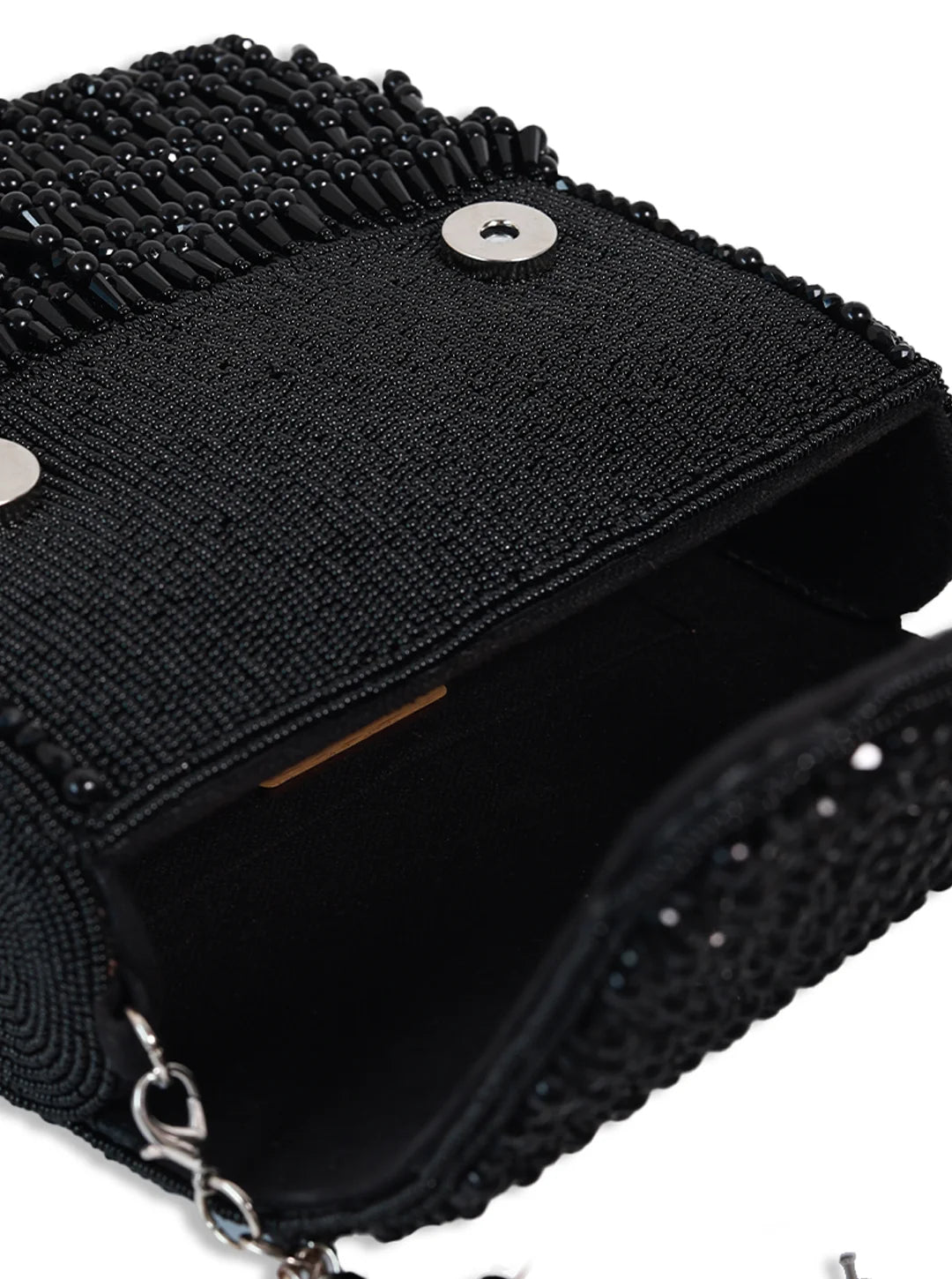 Mira Black Flap Over Bag by The Tan Clan featuring a sleek black leather design with a flap closure and shoulder strap.