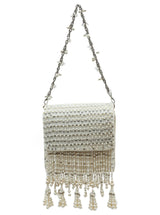 Mira White Flap Over Bag by The Tan Clan, stylish flap bag with sleek white leather and gold-tone hardware on a plain background.