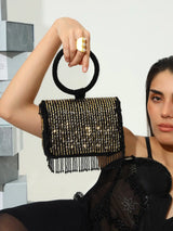 Sylvie Black Flap Over Bag from The Tan Clan featuring a sleek flap design and spacious interior for stylish everyday use.