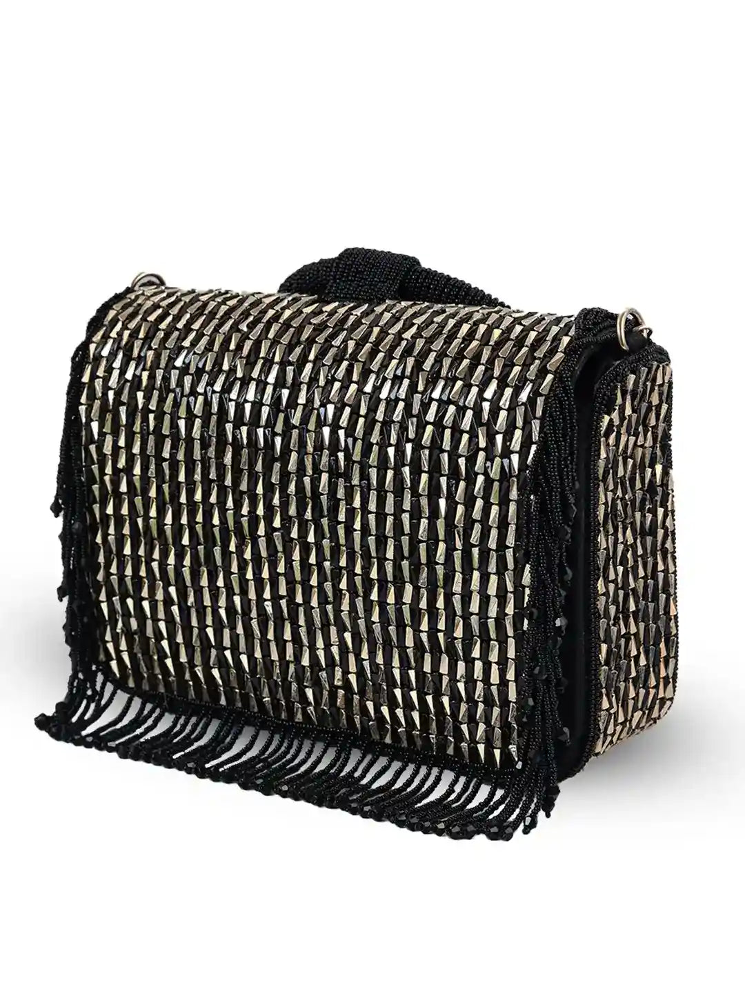Black Sylvie flap-over bag from The Tan Clan featuring a stylish flap closure and spacious interior.