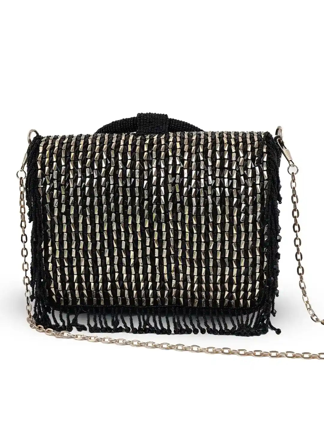 Black Sylvie flap-over bag by The Tan Clan featuring a stylish design and top flap closure.