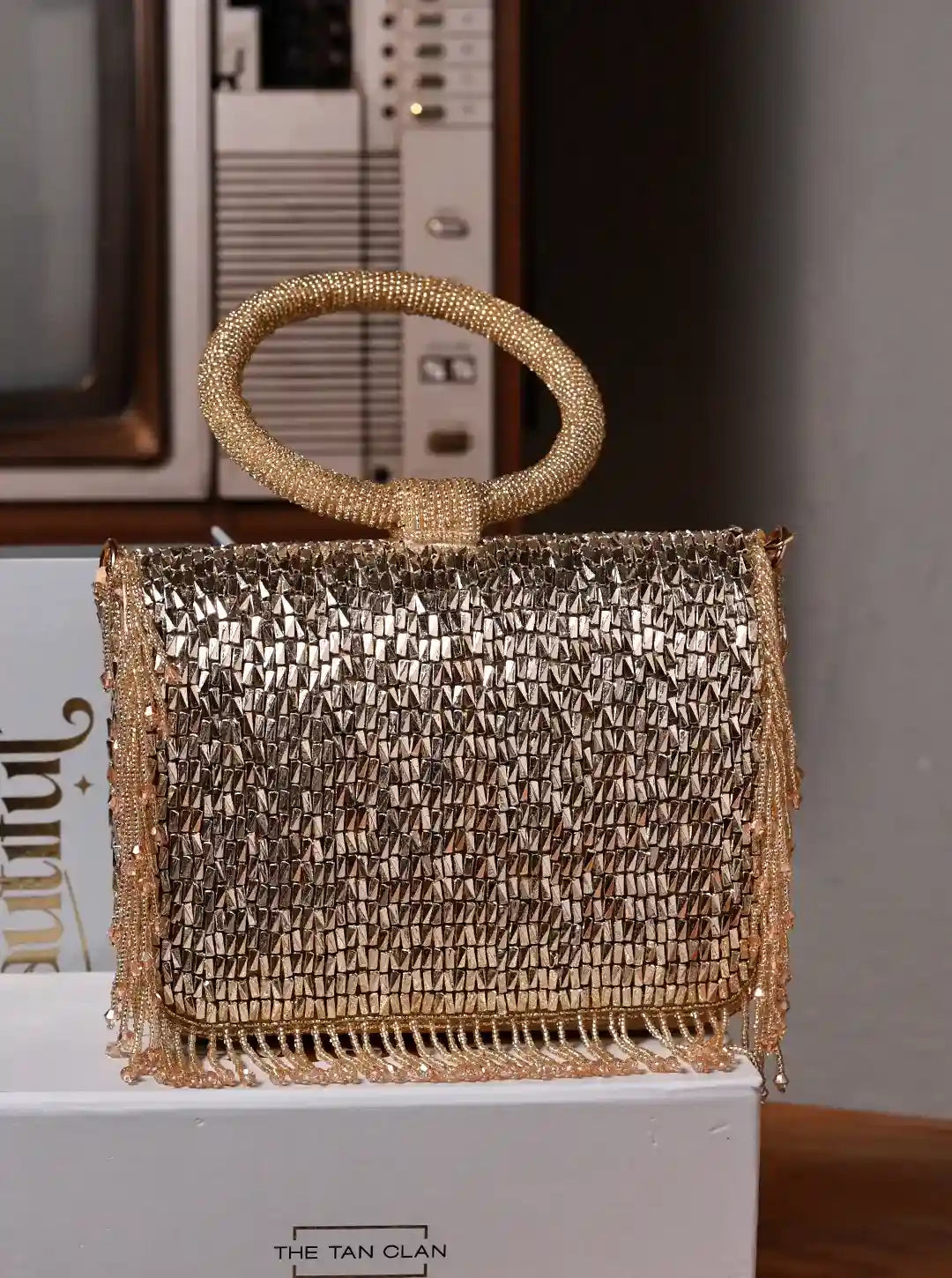 Sylvie Gold Flap Over Bag from The Tan Clan, stylish flap bag with gold accents, featuring a sleek design and structured silhouette.