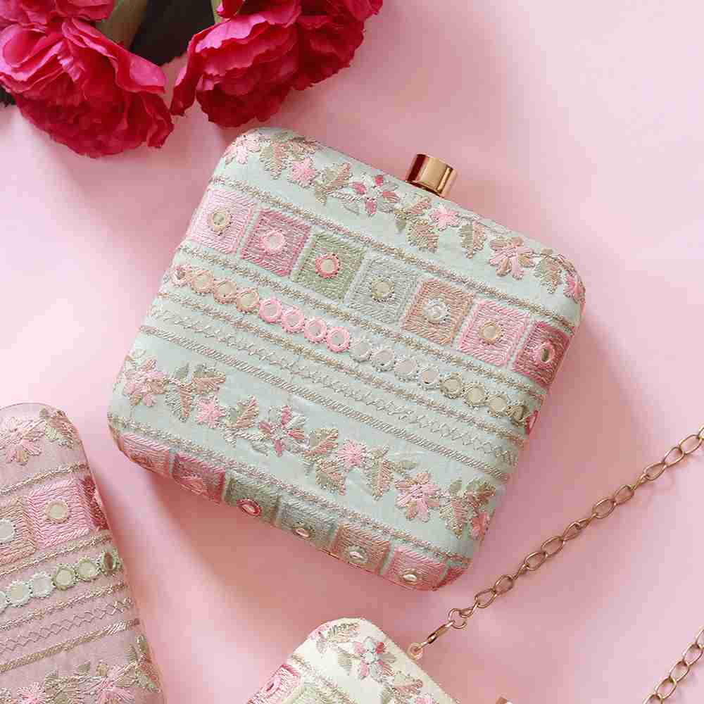 Green Phulwaari floral box clutch by The Tan Clan with intricate embroidery and traditional design for elegant occasions.