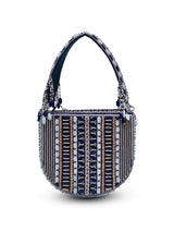 Blue flap-over bag with handle from The Tan Clan featuring a stylish design and spacious interior.