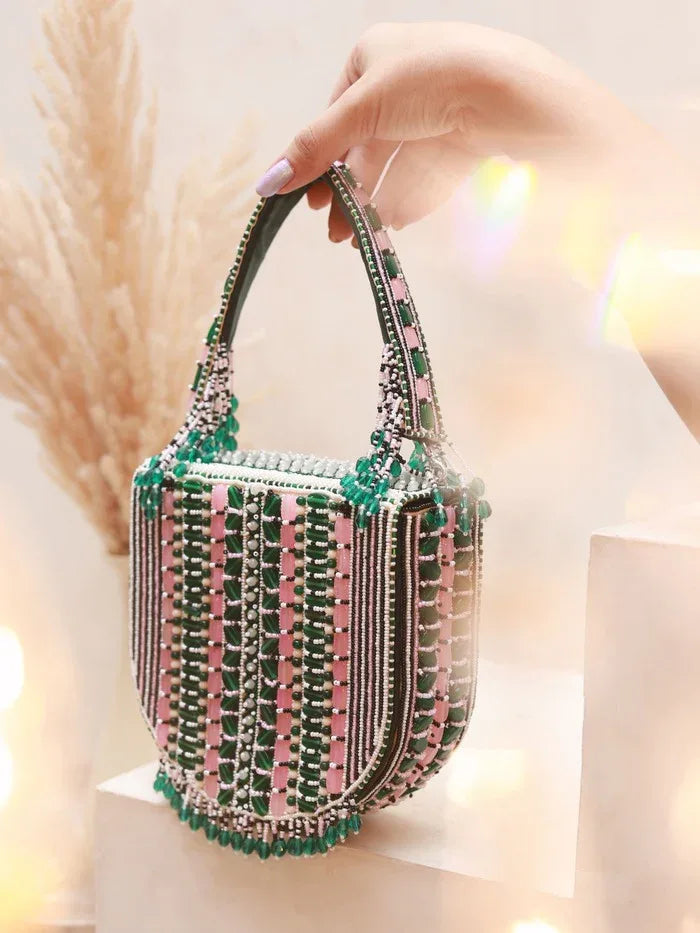 Pink Asma Green Flap Over Bag with Handle by The Tan Clan, showcasing its stylish design and sturdy handle.