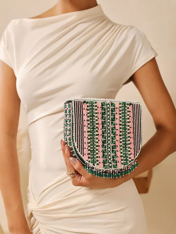 Pink Asma Green Flap Over Bag with Handle from The Tan Clan, showing its stylish design and top handle on a plain background.